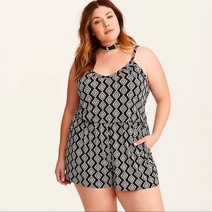 BNWT Torrid Black and Hot Pink Medallion pattern Jersey Knit Romper in size 00x